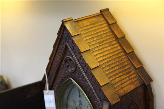 Carrew & Rule, Fenchurch Street, London. A Victorian Gothic design oak hour repeating bracket clock, clock 21in., bracket 15.5in.